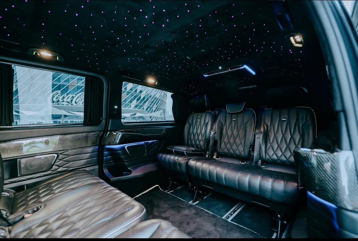 Chauffeured executive van interior, quilted leather and starlight roof